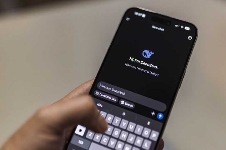 A smartphone displaying the DeepSeek AI chat interface, depicting modern technology use.