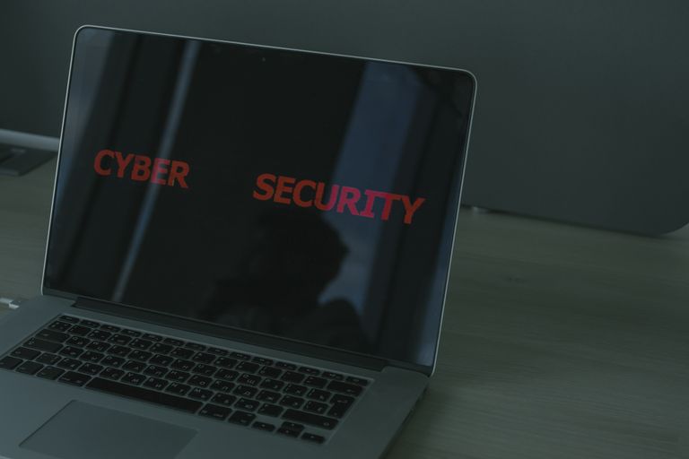 What Is Cybersecurity Close-up of a laptop displaying cybersecurity text, emphasizing digital security themes.