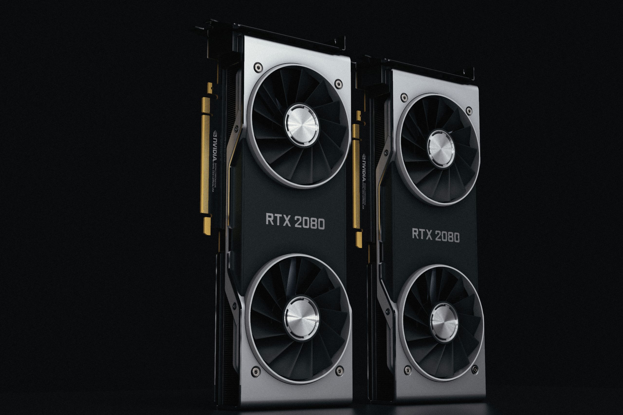 GPU Technology Close-up of two NVIDIA RTX 2080 graphics cards with dual fans, high-performance hardware.