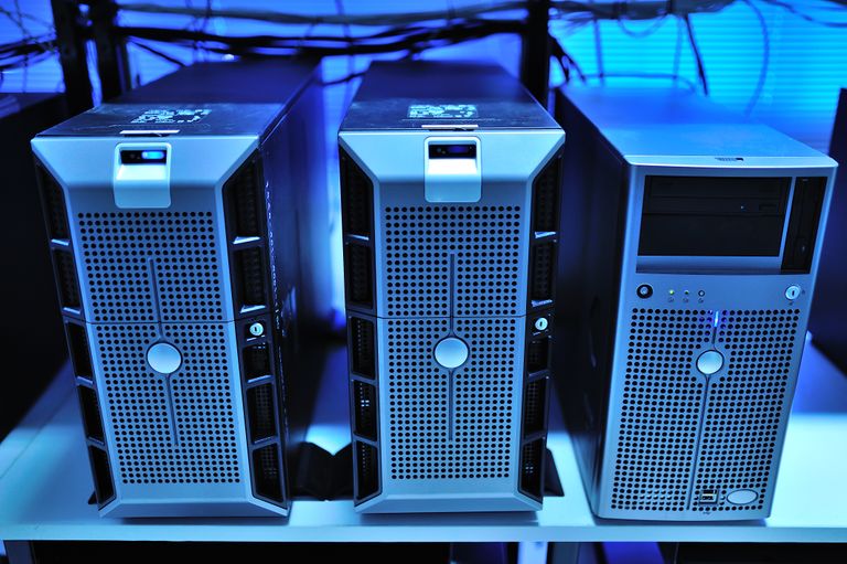 Cloud Computing and Cloud Services Close-up view of modern rack-mounted server units in a data center.